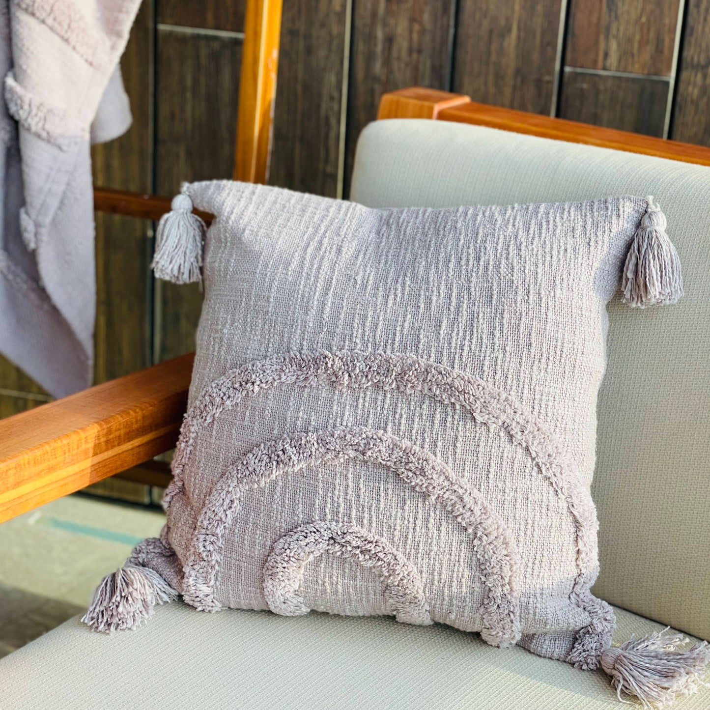 textured and tasseled chic throw pillow