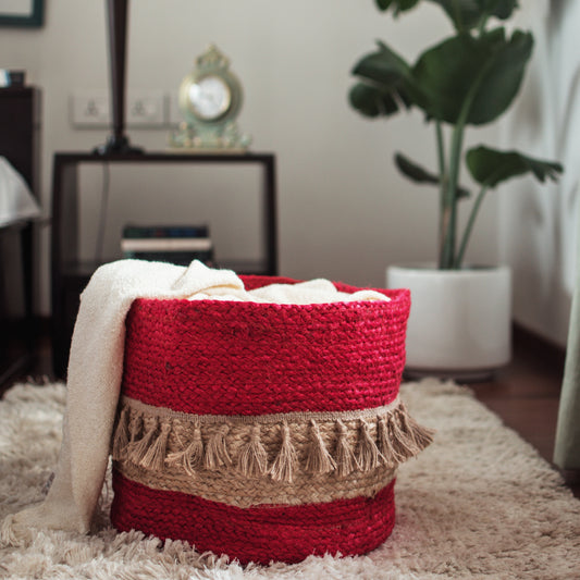 Red tasseled handwoven basket for bohemian homes